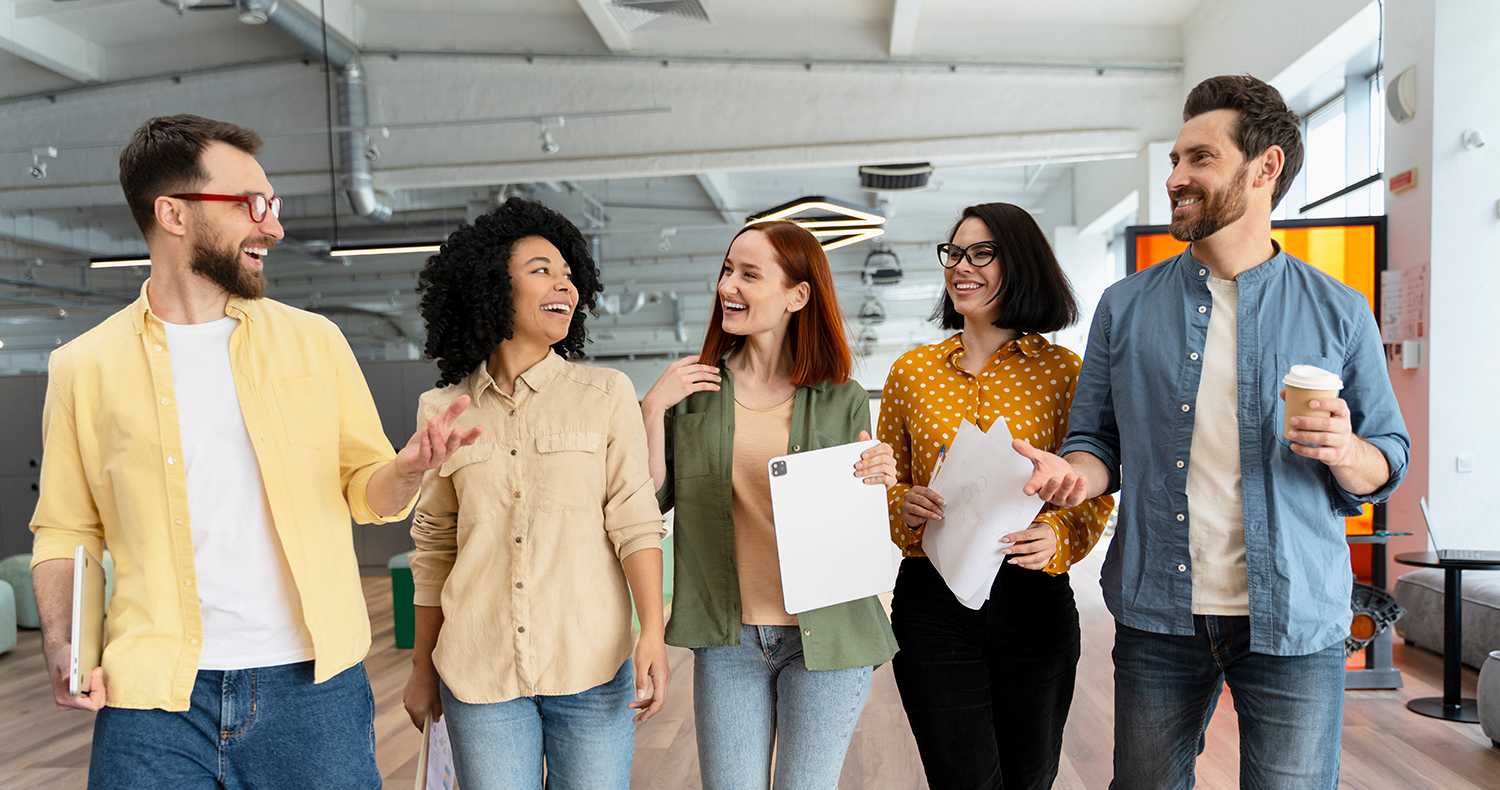 coworkers talking and walking